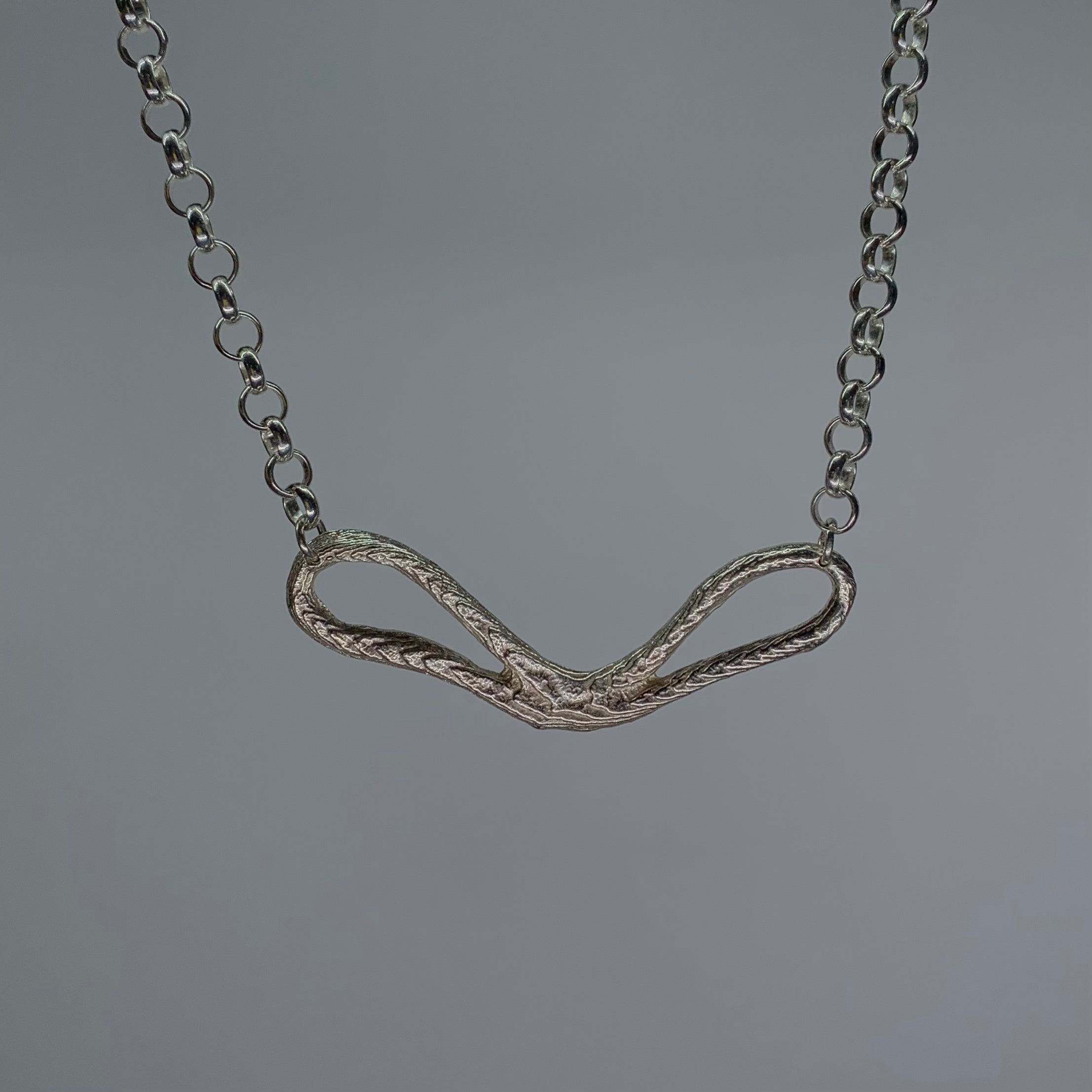 Stretched heart necklace